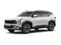 Front three-quarter view of a white Kia Seltos HTK variant against a white background, showing the trim-specific wheel covers and front fascia.